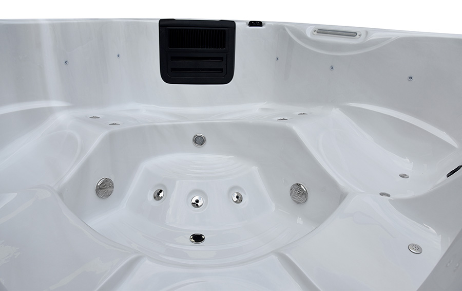 Top view of a five-person hot tub with two loungers and upright seats